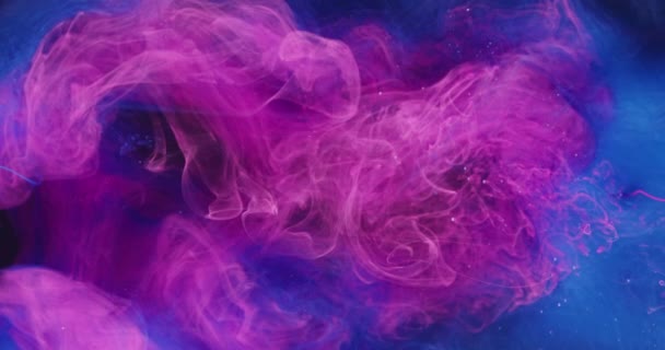 Pintura mezcla en acuarela tinte explosión rosa azul — Vídeos de Stock