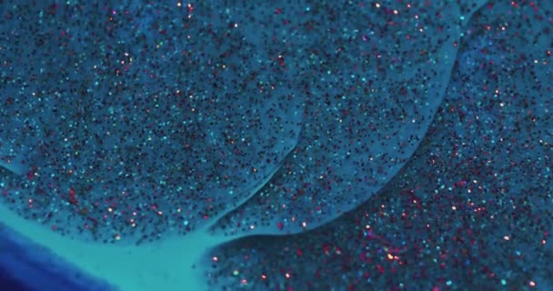 Glitzerflüssigkeit Unschärfe Funken Textur blaue flüssige Tinte — Stockvideo