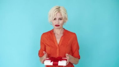 bad gift upset woman unpleasant surprise sad