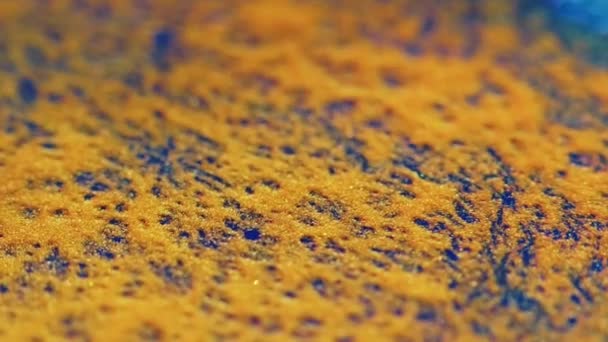 Color foam texture ink water bubbles orange blue — Stockvideo