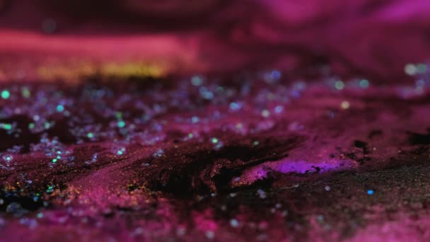 Jiskřivá tekutina textura bokeh světle neon růžová modrá — Stock video