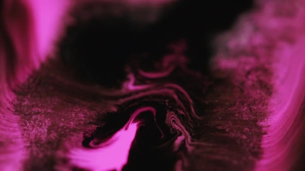 Színes folyadék keverék tinta víz áramlás neon rózsaszín fekete — Stock videók