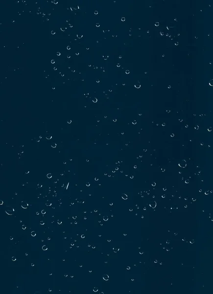 Water drop texture wet window overlay blue glass — Stockfoto