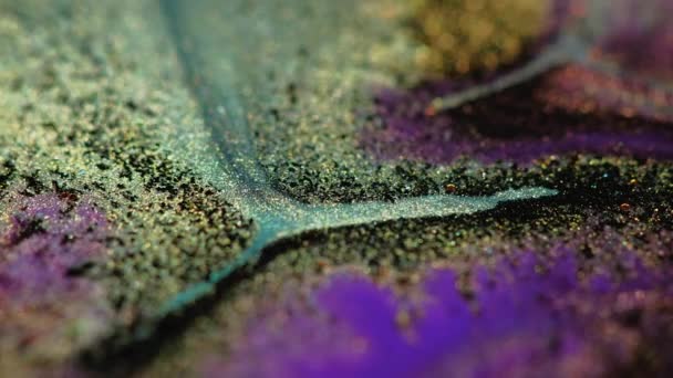 Sparkling fluid texture glitter flow ink wave gold — Vídeo de stock
