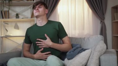 heavy meal suffering man stomach pain casual