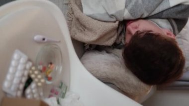 covid infection sick man home recovery sneezing
