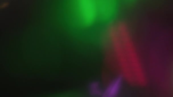 Defocused glow overlay bokeh light blur flecks — Stok video