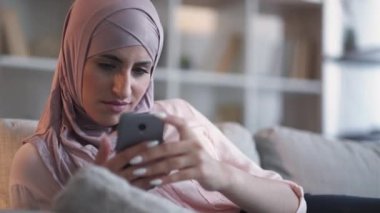 spam message internet bullying woman phone home