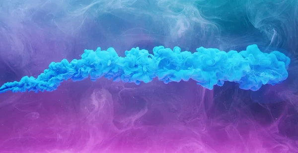 Ink water explosion. Harmony balance. Blue pink acrylic paint spill. Abstract art background shot on Red Cinema camera 6k.