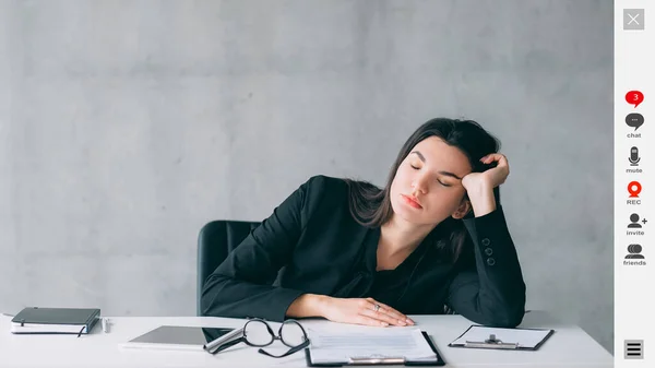 Virtual conference. Boring woman. Screen mockup. Sleeping lady sitting desk leaning hand having online webinar in light room interior.