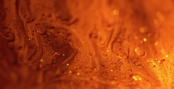 Glitzerfarbe Fließt Geschmolzenes Gold Schwimmende Tinte Defokussierte Gelb Orange Funkelnde — Stockfoto