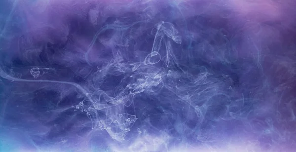 Ink water burst. Fantasy cloud. White paint flow. Purple creative abstract background shot on Red Cinema camera 6k.