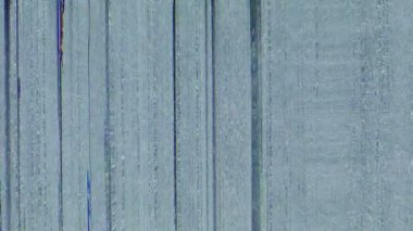 VHS gürültü örtüsü. Arıza dokusu. Eski bir televizyon paraziti. Mavi renkli bulanık tahıl statik analog bozulma nesneleri soyut arkaplan.