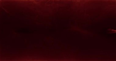 Paint mix in water. Color smoke blast. Logo opener. Orange fluid underwater explosion on dark steam cloud abstract art background shot on RED Cinema camera.