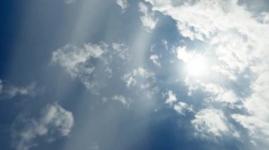 Sky paradise. Tranquil mind. Aerial freedom. Beautiful white fluffy clouds flying away in clear blue sunshine heaven fast motion.