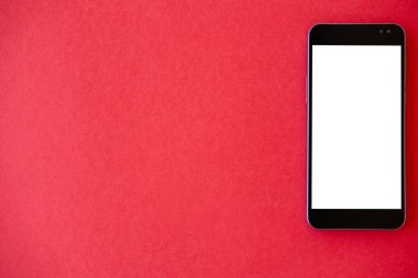Mobile mockup. Online connection. Digital life. Smartphone with blank white screen isolated red copy space.