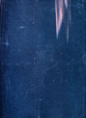 Dust scratches overlay. Distressed texture. Faded screen photo editor filter. Blue grain noise pink color light flare on dark grunge copy space illustration abstract background.