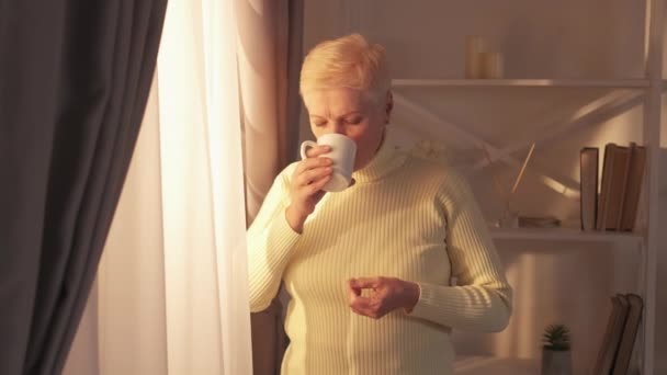 Relaxing Elderly Domestic Coffee Retirement Freedom Serene Dreamy Senior Woman — Video Stock