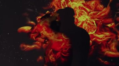 Summer heat. Global warming. Hot weather. Climate change. Annoyed shirtless man suffering from unbearable high temperature in red orange burning fire flame blast projector light.