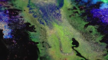 Glitter paint mix. Sparkling dye wave. Suminagashi swirl. Blur green black gold blue color shimmering wet ink pour motion abstract art background.