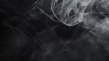 Smoke cloud motion. Mist texture. Transition overlay. Fire smog. White transparent vapor spreading on dark night black abstract background for intro.