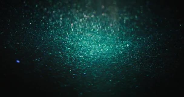 Particles Background Bokeh Light Glitter Defocused Verdigris Green Color Bubbles — 图库视频影像