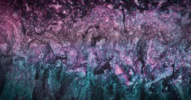 Particles background. Glitter fluid. Sequin flow. Defocused blue pink color holographic shiny ink mix abstract grain texture for intro. Shot on RED Cinema camera.
