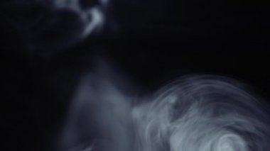 Smoke swirl. Mist texture. Logo opener transition. Glowing fume cloud. White vapor flow motion on dark night black abstract background.