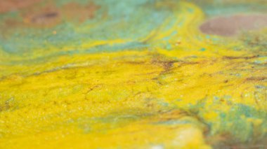 Mixed paints art. Abstract design background. Yellow blue blend