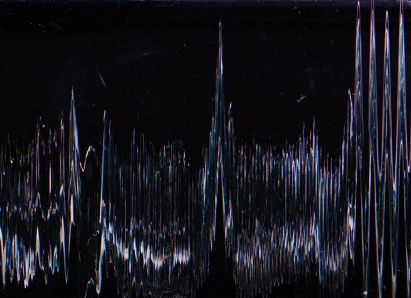 Glitch noise texture. Dust scratches overlay. Old distressed screen. Blue purple white digital vibration artifacts stains on dark black abstract illustration background.