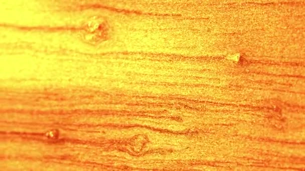 Vertical Video Golden Glitter Texture Shimmering Liquid Flow Yellow Sparkles — Stock Video