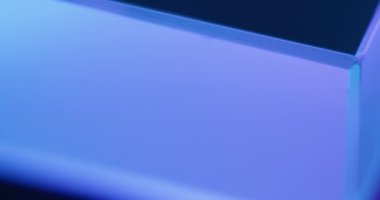 Neon glow motion. Futuristic background. Geometric figure. Defocused tranquil blue color light abstract copy space for logo. Seamless loop rotation. Shot on RED Cinema camera.