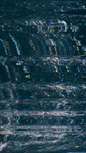 Glitch background. Noise texture. Electronic distortion. Digital defect. Blue orange color pixel static artifacts on dark black abstract illustration overlay.