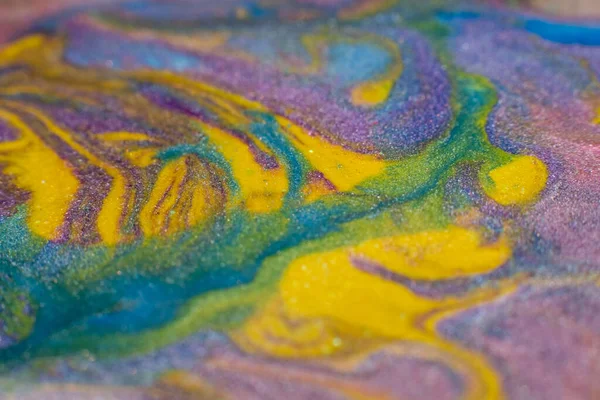 Abstract painting. Acrylic magic. Creative art. Blue yellow purple fluid paint blend