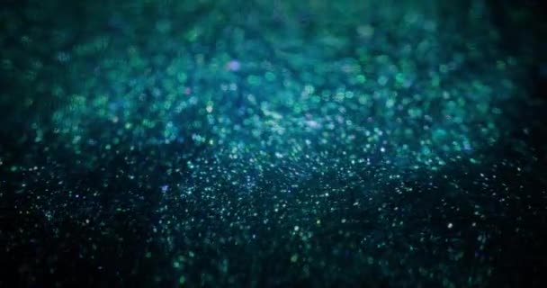 Color Bokeh Glitter Particles Background Galaxy Nebula Defocused Fluorescent Blue — Stockvideo
