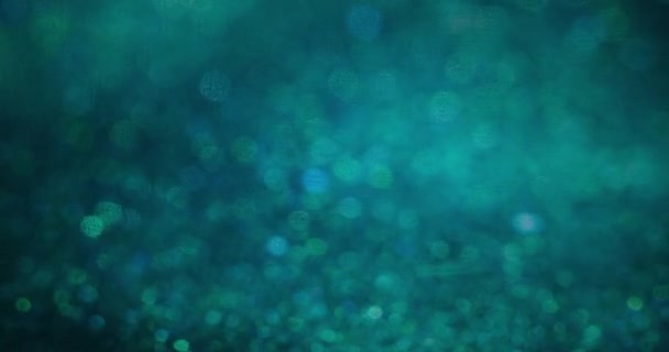 Bokeh Light Texture Particles Background Blur Glowing Sparkles Defocused Green — Vídeos de Stock