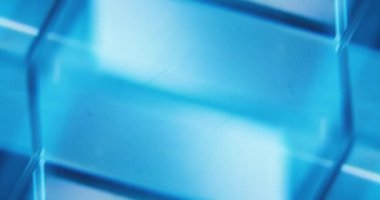 Neon flash background. Futuristic light reflection. Defocused blue white color flicker glow geometric abstract copy space for text. Seamless loop rotation. Shot on RED Cinema camera.