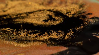 Mixed paints art. Abstract design background. Orange black colors blend