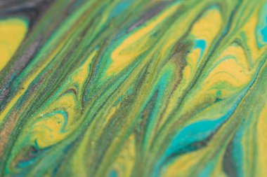 Renkli karışım. Akışkan sanat. Yaratıcı resim. Yüzen mavi, sarı, parlak sıvı boya akıntısı