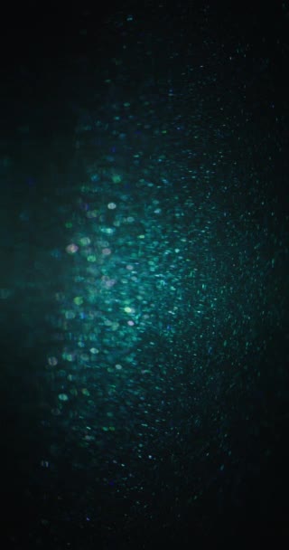 Deeltjesachtergrond Waas Glitter Textuur Glanzende Cirkels Waterreflectie Gedempte Blauw Groene — Stockvideo