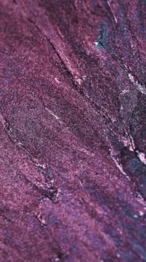 Vertical video. Sparkles fluid flow. Glitter wave. Shimmering liquid. Pink blue color liquid particles abstract texture holographic background. Shot on RED Cinema camera.