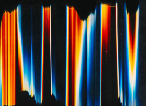 Glitch noise. Aged film. Distortion texture. Orange blue white rainbow color glow dust scratches on dark black illustration abstract background.