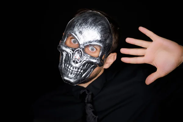 Een Man Met Een Skelet Masker Toont Een Verscheidenheid Aan — Stockfoto