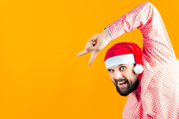 Ein Mann Mit Weihnachtsmannmütze Blickt Vom Rand Des Rahmens Und — Stockfoto