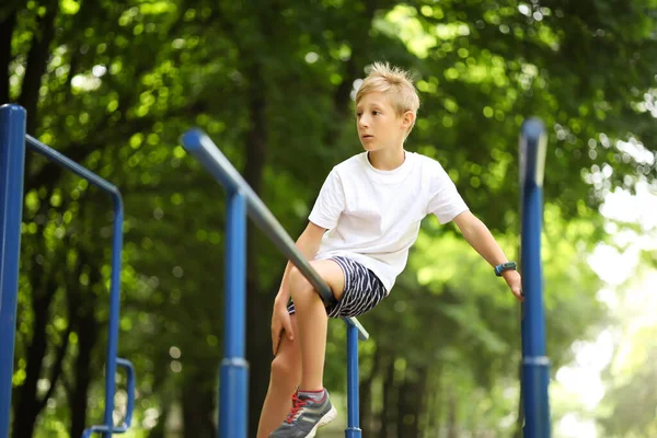 Boy Sports Ground Park Climbed Sports Equipment Looks While Sitting — Stock Photo, Image
