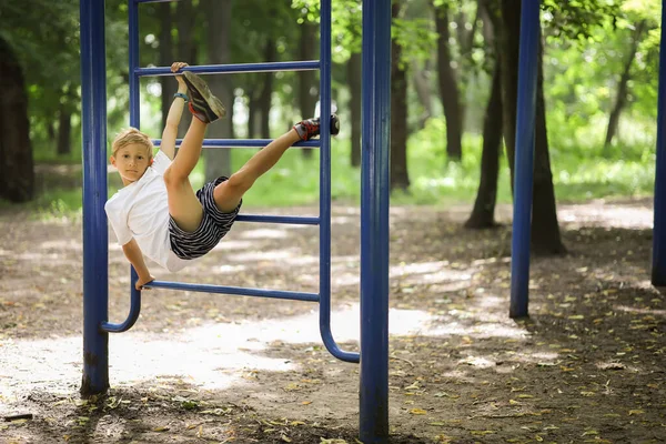 Park Sports Ground Boy Climbed Stairs Hung His Legs Hooked — Stock Photo, Image