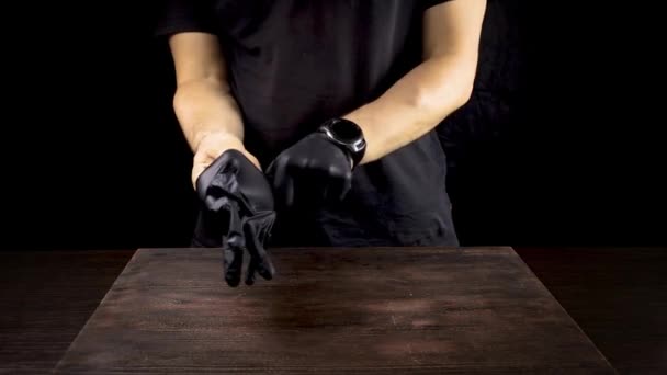 Man Puts Black Gloves Cutting Jamon Thin Pieces — Stock Video