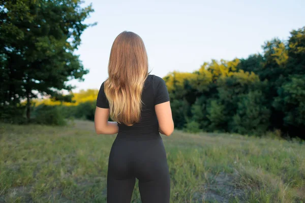 Young Sports Girl Stands Her Back Looks Distance —  Fotos de Stock