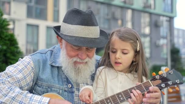 Close Caring Senior Caucasian Grandpa Teaching His Happy Lovely Little — Stok video