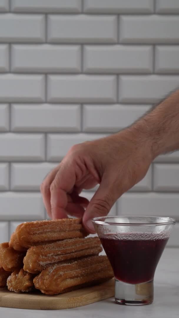 Vertical Video Dipping Churro Raspberry Sauce — Stock Video